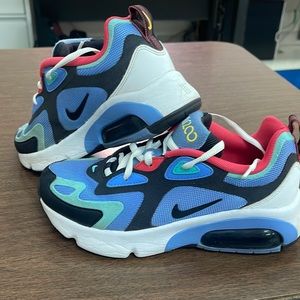 Youth Size 4 Nike tennis shoes. Great condition!